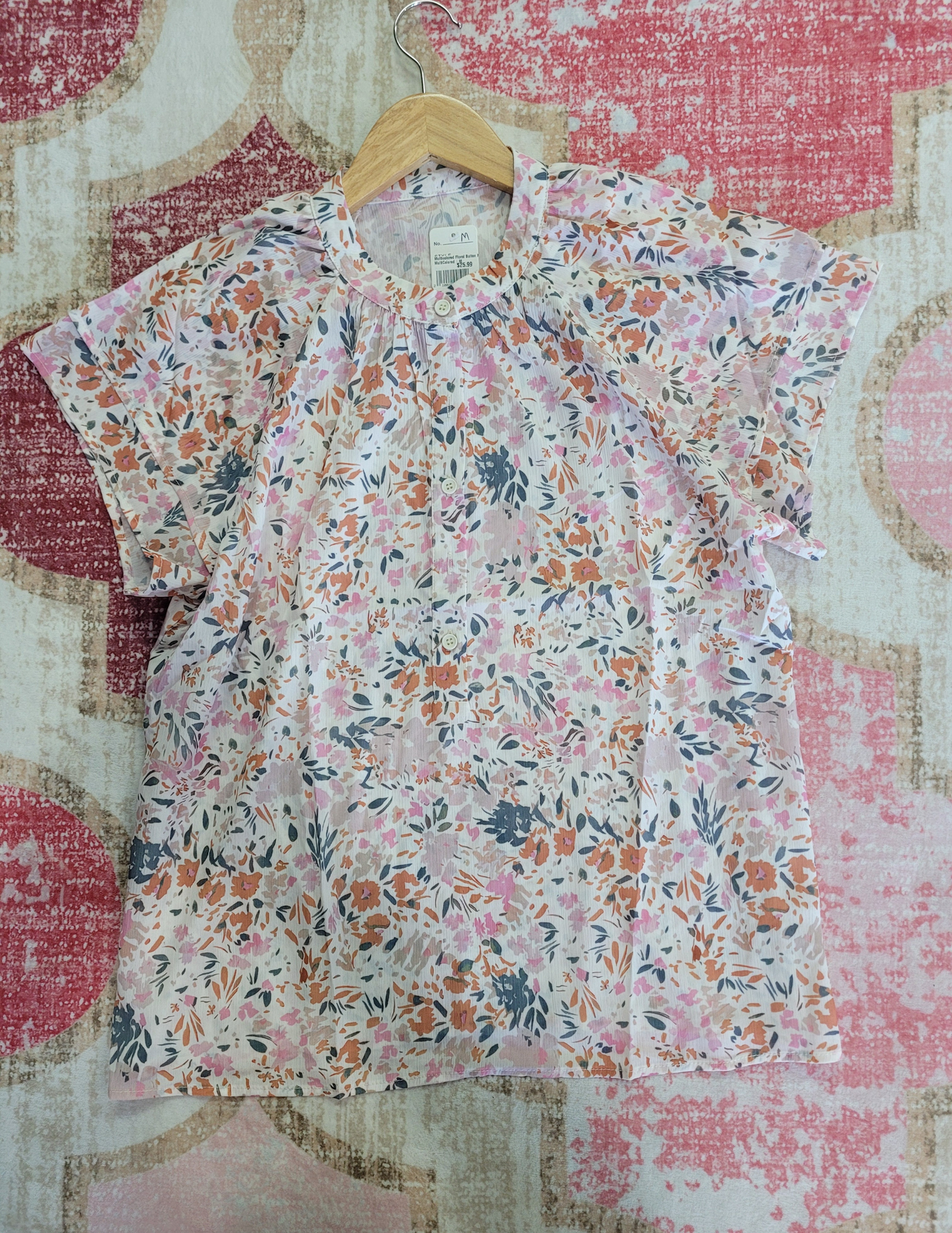 multicolored floral half button down shirt