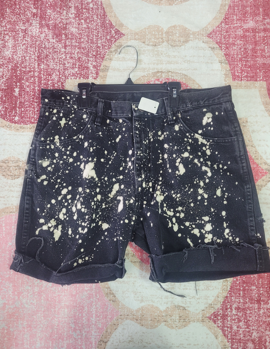Black bleach spotted long jean shorts